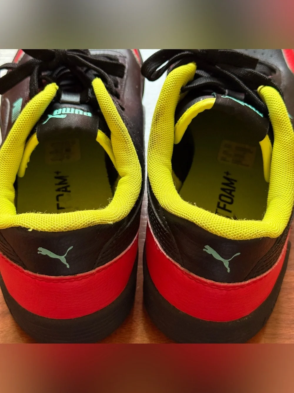 Puma Caracal sneakers men's size 7.5 women's size 9 black high-risk red nrgy